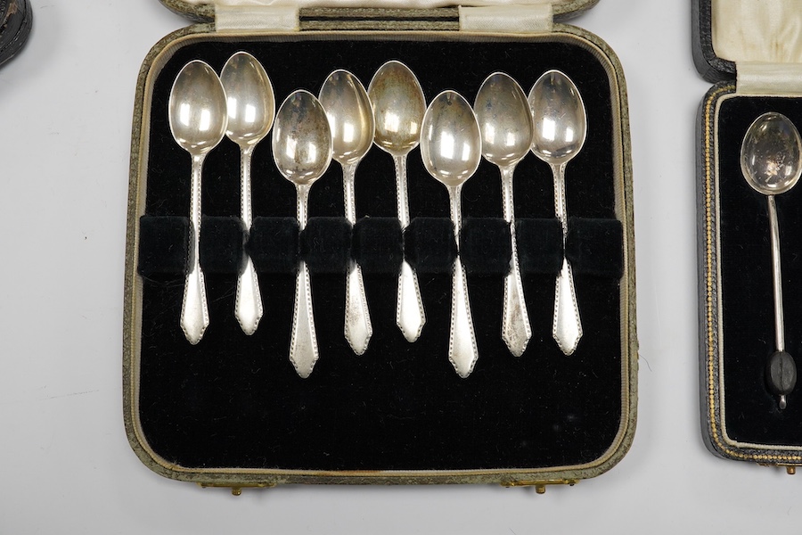 A cased set of twelve late Victorian silver coffee spoons, by Goldsmiths & Silversmiths Co Ltd, London, 1890 and three other later cased silver sets including six bean end coffee spoons, eight coffee spoons and twelve pa